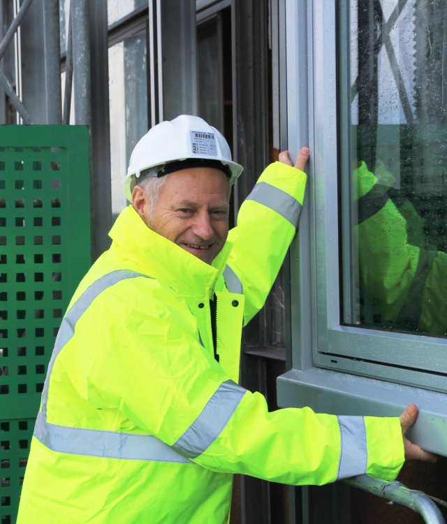 Stuart Cutfoth installing Window for new Chesterfield College building