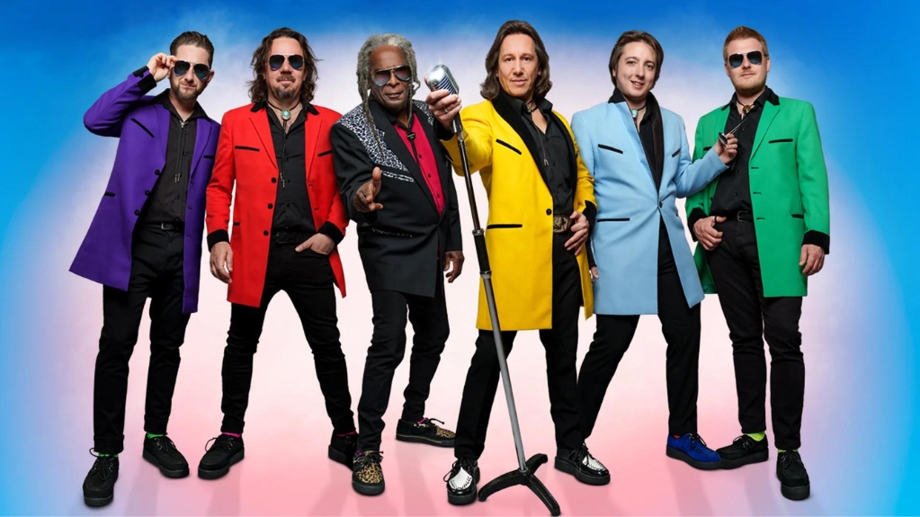 Rock and roll band Showaddywaddy in colourful suits on stage