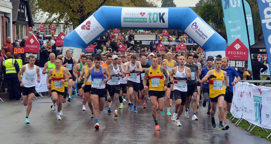 Runners crossing the finish line at Chesterfield 10k