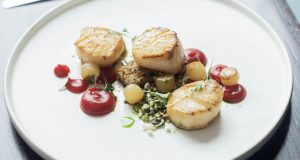 scallops on a white plate
