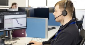 Male at computer with headset at Central Technology, Dunston