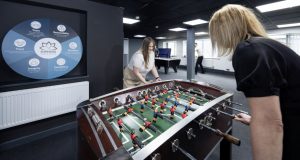 Females playing table football in staff area at Superior Wellness, Chesterfield