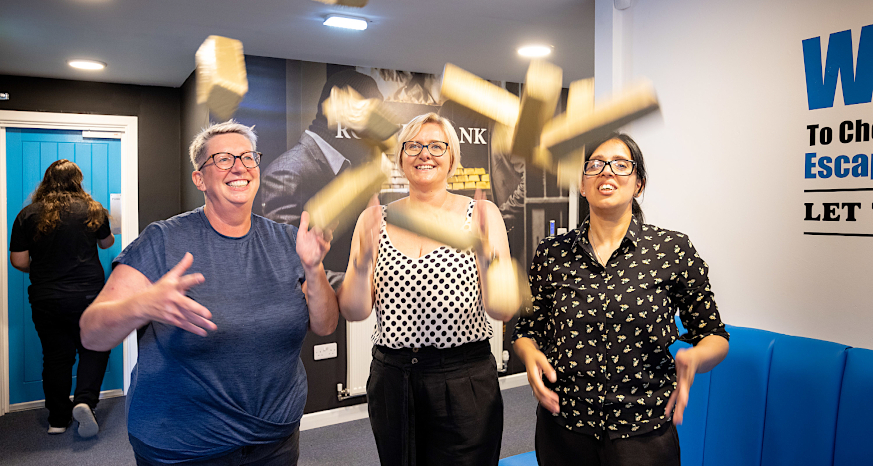 Three women having fun at Chesterfield Escape Rooms