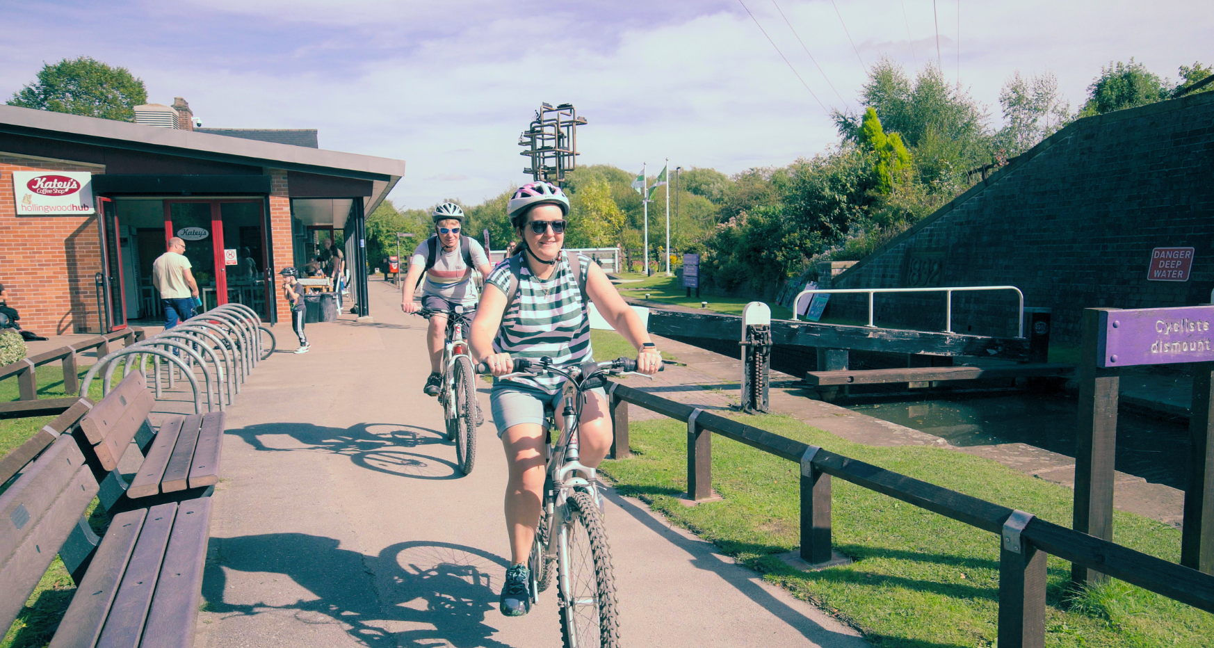 Woman cycling down Chesterfield Canal