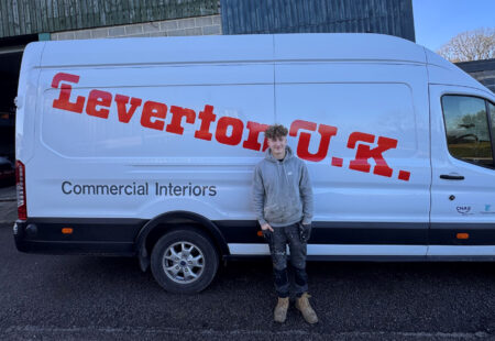Recce Leverton Apprentice stood in front of company van