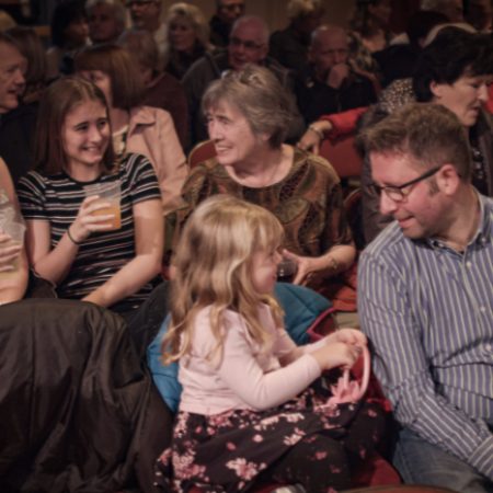 Family in the audience at the Winding Wheel Theatre