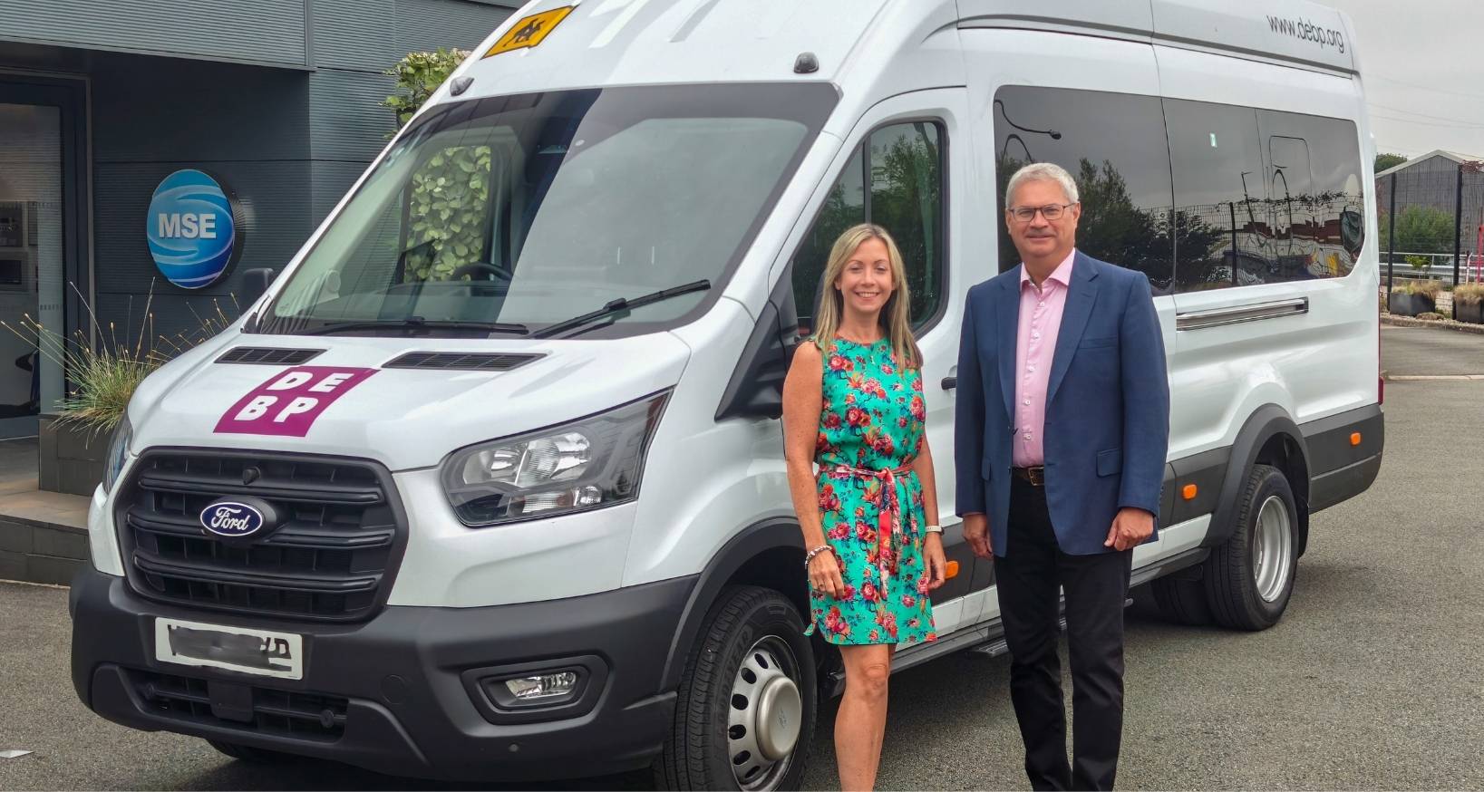 DEBP Mini Bus parked outside MSE Hiller Factory at Markham Vale