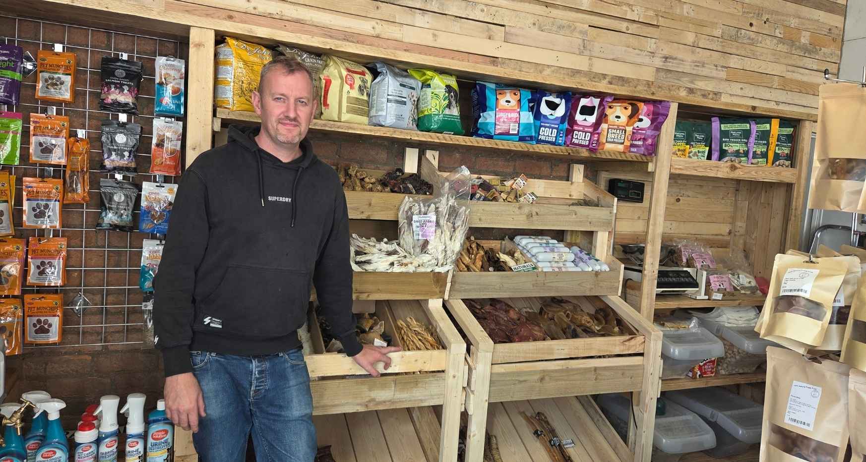 Owner of Raw4All stood in his shop