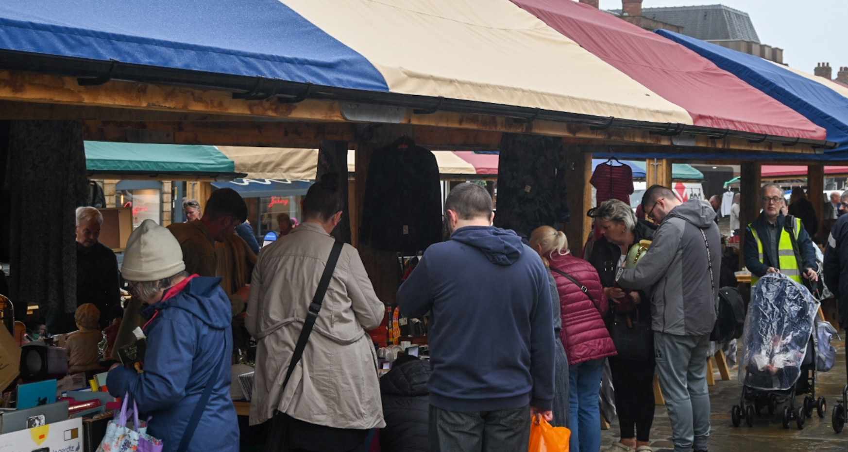 People browsing market stalls at Chesterfield Market