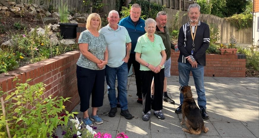 Residents standing in their community garden in Chesterfield