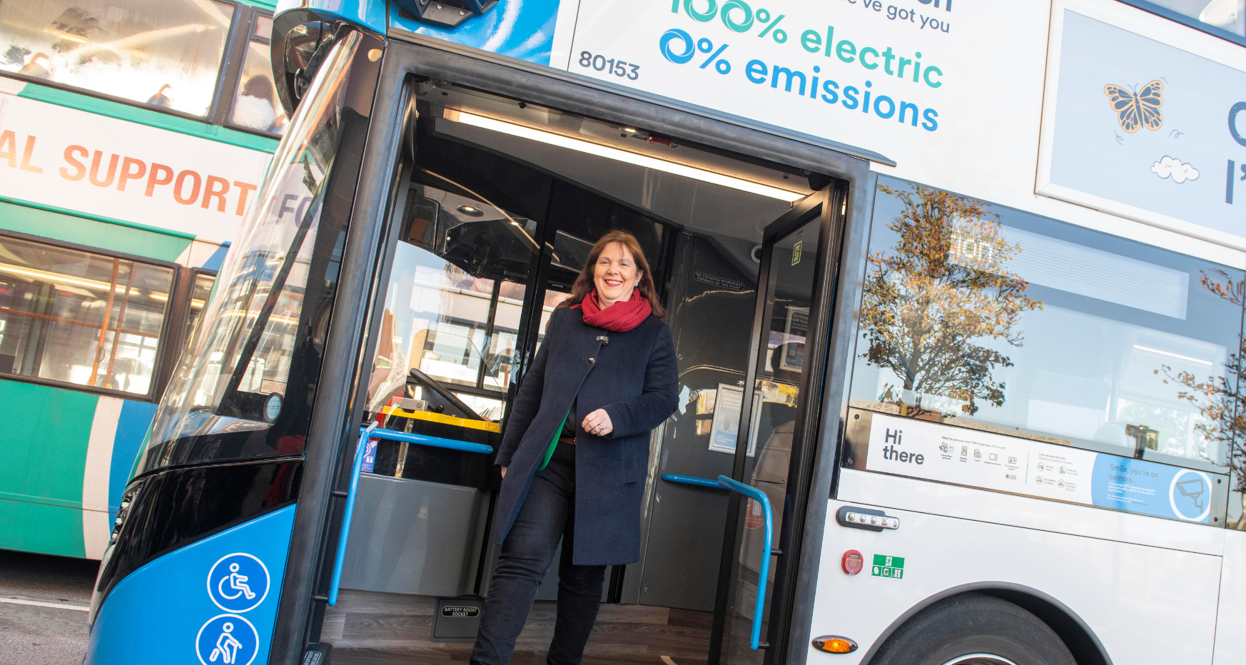 Mayor Claire getting off a bus