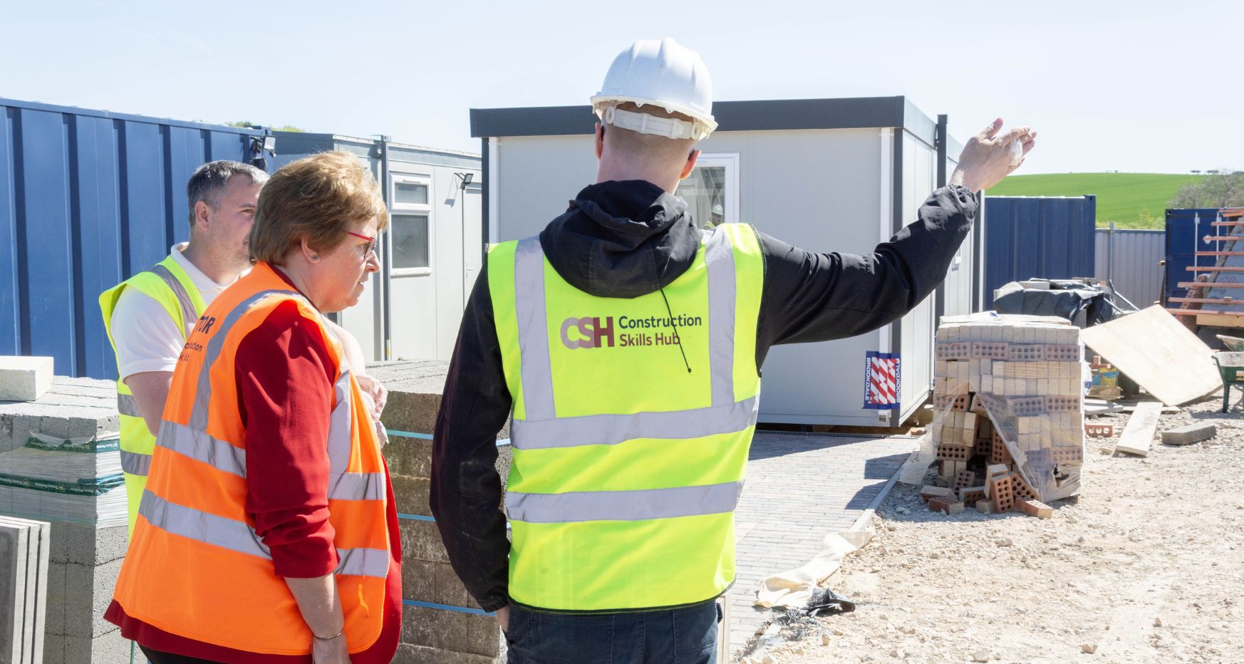 Matt Malkin, Cllr Gilby and a learner being given a tour of Construction Skills Hub