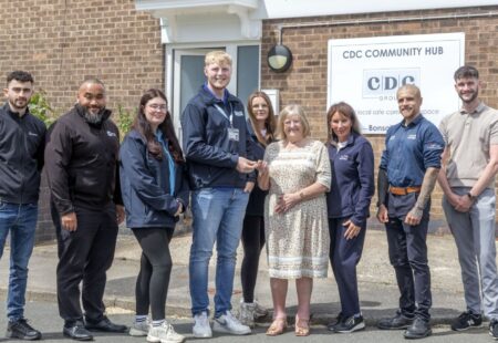 Apprentices standing outside Bonsall Court Community Development Chesterfield
