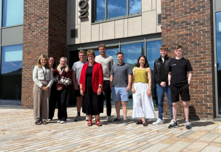 Cllr Tricia Gilby, with representatives from Nuzest, Best Solicitors, and Intuitive Infrastructure Solutions