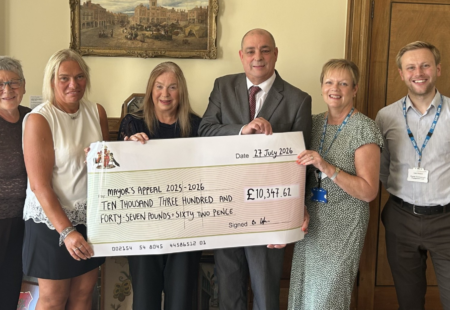 Cllr Barry Dyke and Marie Dyke with representatives from Poolsbrook Social Welfare Scheme and Chesterfield Royal Hospital Trust Charity Community