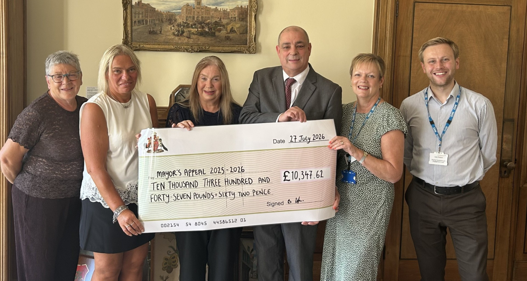 Cllr Barry Dyke and Marie Dyke with representatives from Poolsbrook Social Welfare Scheme and Chesterfield Royal Hospital Trust Charity Community
