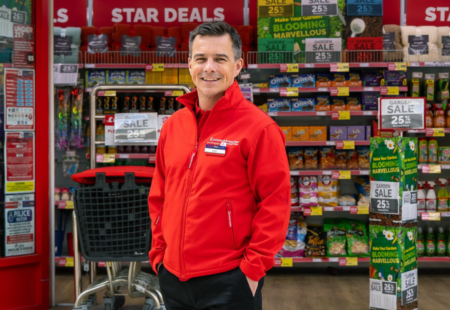 Poundstretcher man outside building