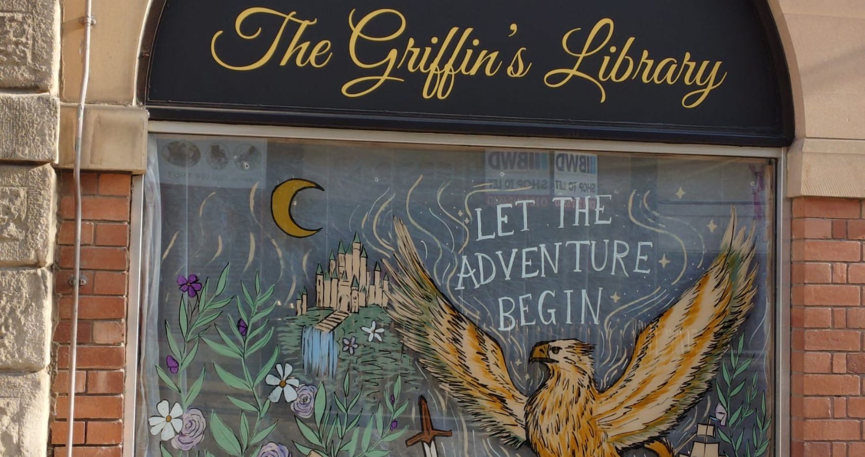 Shop exterior of The Griffin's Library in Chesterfield town centre