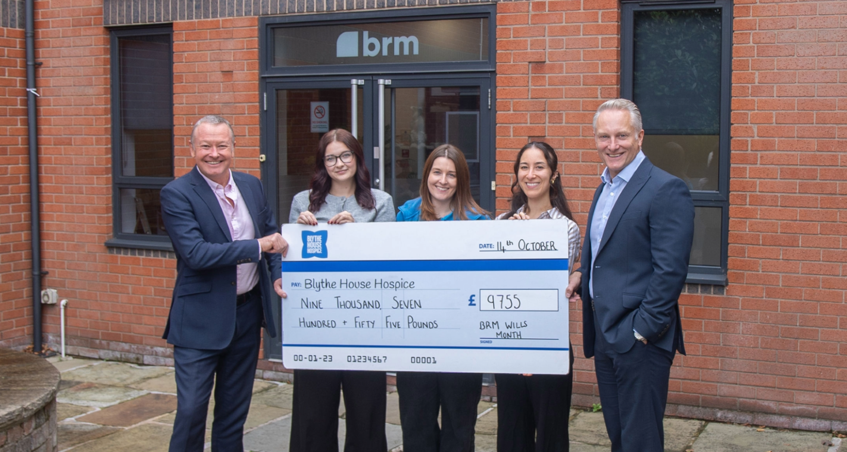Celebrating the success of their recent Wills Month campaign are (from left) Rob Woodhead executive director at BRM, paralegals Grace Blant, Emily Passey, corporate fundraiser at Blythe